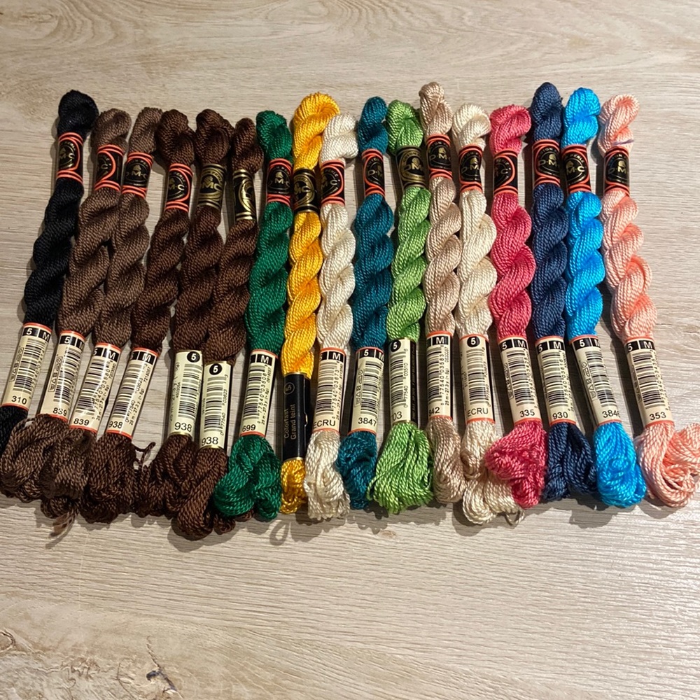 DMC Size 5 Pearl Cotton thread. The threads are new and unused.